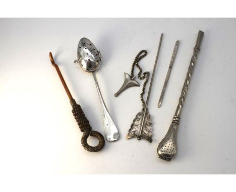 A collection of silver and silver plate. Including  a mate straw, a silver darning needle, a copper coil boot hook, a knittin