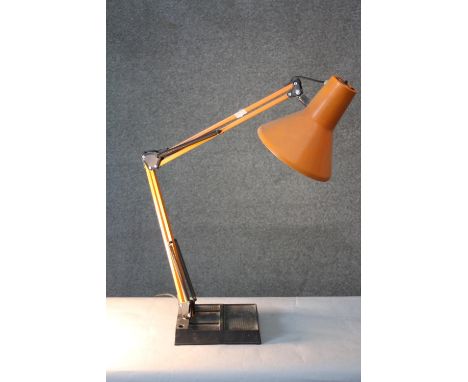 A vintage Danish orange HCF anglepoise style lamp. 
H.77 W.20 cm. 