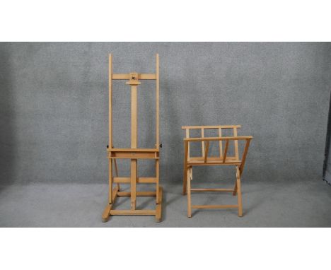 A contemporary Daler Rowney beech framed easel along with a folding folio stand. 