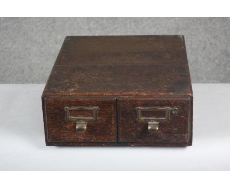 A vintage oak desk top two drawer filing chest. H.13 W.33 D.42 cm. 