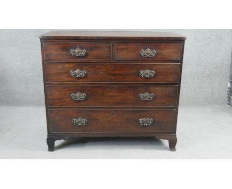 A 19th century mahogany chest of drawers on shaped bracket feet. H.95 W.110 D.54cm 