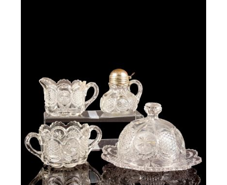 A vintage set of depression glass creamer, sugar bowl, syrup dispenser, butter dish with lid. Creamer: 5.5"L x 3.5"W x 3.25"H