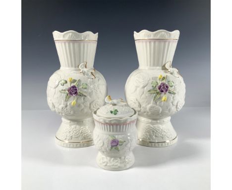 Two porcelain vases embossed with roses and Celtic knots and adorned with flowers and a finch, and a keepsake embossed with r