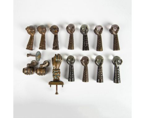 This set includes 11 glass ball and claw feet, along with a set of two claw themed casters and a three-piece door knocker. La