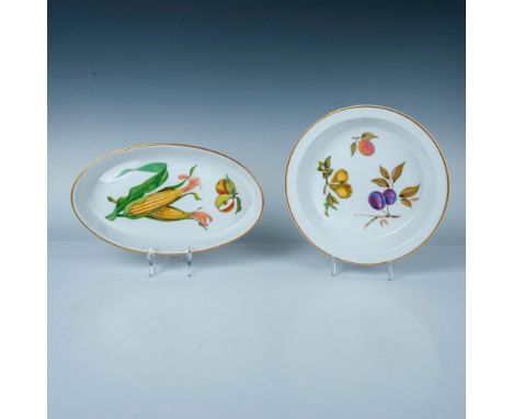 One round dish decorated with fruits and gilding on the rim. Measures 10.25"dia. x 1.5"H. Oval serving dish decorated with co