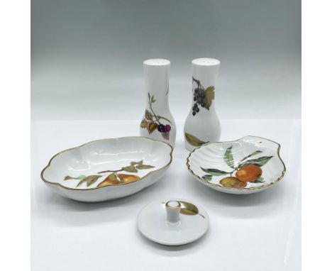 5 separate service pieces in white porcelain and decorated with fruits. Salt and pepper shakers measure 4.75"H x 2"dia. Scall