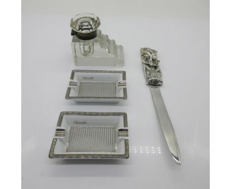 Group of four decorative objects. Includes one desktop glass inkwell step design mounted with a brass hinge and three grooves