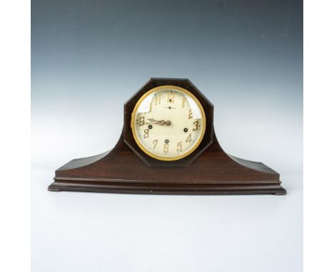 Original New Haven harmonist mantle clock in mahogany with Westminster chimes. The curved thick beveled glass cover opens and