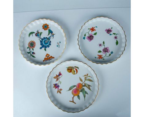 Three pie plates decorated with fruits and flowers. Evesham, Astley, and Palmyra patterns. Royal Worcester backstamp. Largest