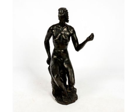 Large sculpture modeled in the impressionist style with dark patination. Depicts woman seated on rocky textured column.Artist