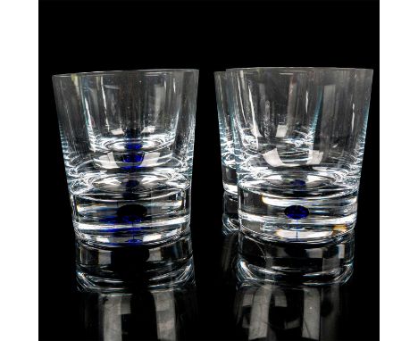 Clear blown glass cups decorated with the blue drop in the stem. Orrefors etched backstamp. Artist: Erika LagerbielkeDimensio