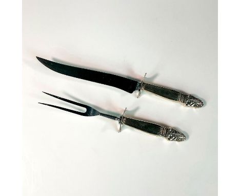 Elegant meat carving set consisting of a large knife and fork in an intricate textured pattern. Marked Insico Stainless to bl
