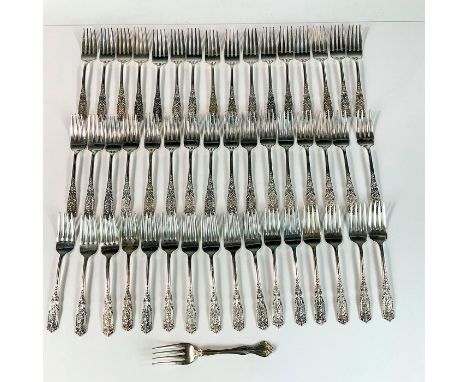 Elegant sterling silver flatware decorated on handles with a floral motif. Includes 1 salad fork in the George &amp; Martha W