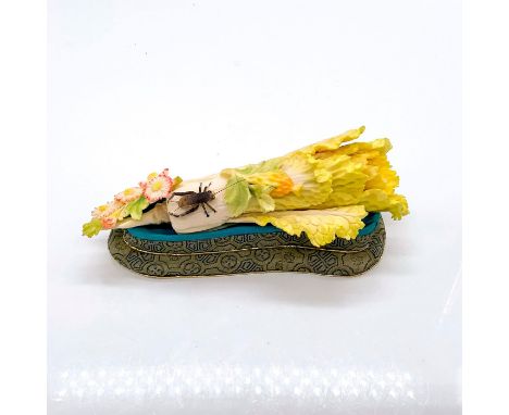 Depicts intricately carved, lifelike cabbage with small flowers and cricket resting atop. This item has a base included with 