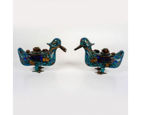 2 brass and enamel figural ducks, brass holding lotus reeds. Dimensions: 8.25"L x 3.5"W x 5.75"HCountry of Origin: ChinaCondi