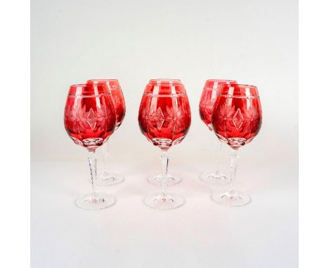 Stunning set of wine glasses with cut to clear ruby coloration, frosted floral pattern, and faceted stems. Varga acid mark to