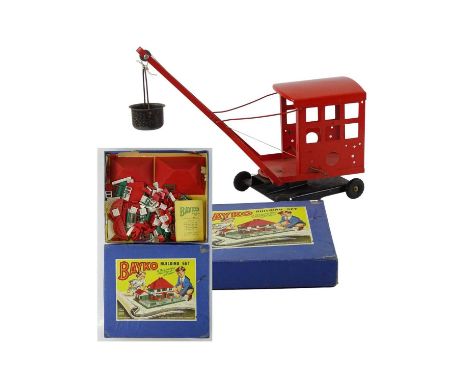 A BAYKO No. 1 Building Set together with a TRI-ANG large pressed steel crane with bucket - G in G box where boxed