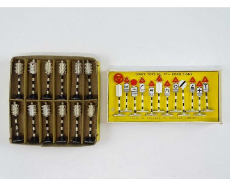 A set of DINKY No. 47 Road Signs in the earlier style buff box, together with a DINKY 773 set of Robot Traffic Signals - G in