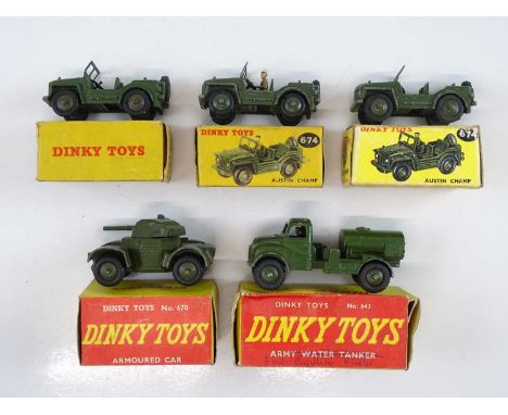 A group of DINKY military vehicles comprising a 643 Army Water Tanker, a 670 Armoured Car, and 3x 674 Austin Champ (one in re