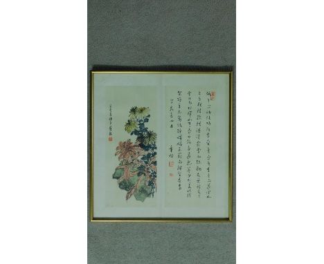 A framed and glazed 20th century Chinese silk painting of chrysanthemums and foliage with inscription and artist's seal mark.