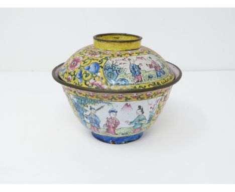 A late Qing Canton enamel lidded tea bowl. Decorated with Chinese figures and flowers on an imperial yellow ground, pale pink