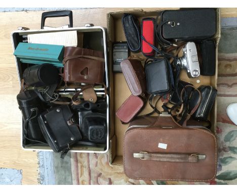 Two boxes of collectable cameras, camera cases, lense cases, etc 