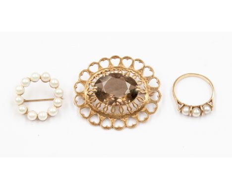 A 9ct openwork brooch set smokey quartz, a 9ct cultured pearl wreath brooch and a pearl ring (3)