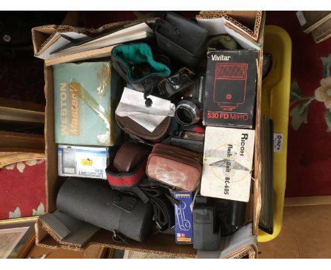 Cameras, lenses etc, also nine volumes of 'You and Your Camera', and a collection of cassette tapes (3 boxes)