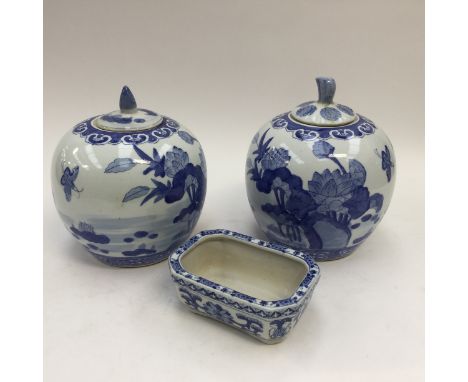 Two melon vases and covers; together with a Bonsai trough, blue white 