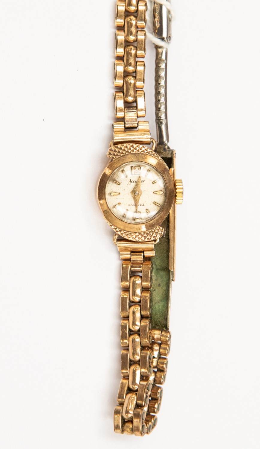 A ladies vintage Accurist 9ct gold watch on plated bracelet A ladies vintage Accurist 9ct gold watch on plated bracelet