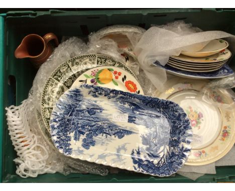 A 19th Century Armorial earthenware plate, circa 1861, a blue white Chinoiserie plate, a quantity of 1800s 'Lucknow' dishes, 