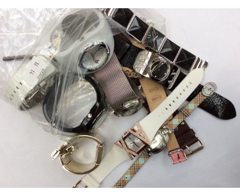 A collection of ladies watches to include the brands Fossil, Mango, AX Paris, Red Herring and D&P, various designs with metal