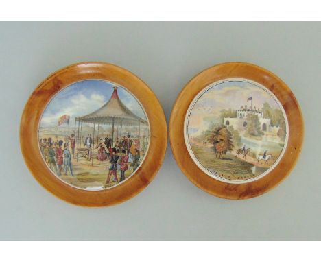 Two Staffordshire Prattware Polychrome Pot Lids mounted in light wood frames. 'Wimbledon July 2nd 1860 ' and 'Walmer Castle'C