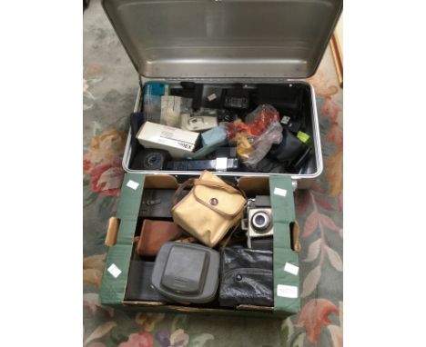 A metal case of camera accessories and a box of various collectable cameras 