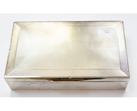 A large cigar and cigarette box, approx 40.83ozt/1270.0g, engine turned decoration, Birmingham 1965