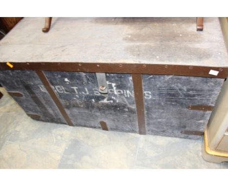 A 19th Century iron bound wooden travelling trunk, probably for use on a ship