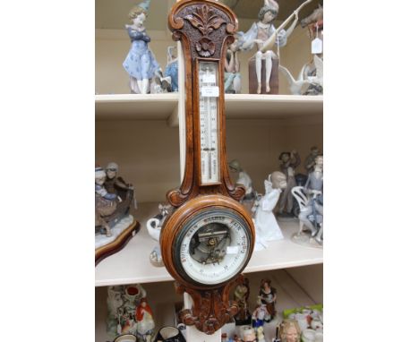 Victorian carved oak barometer with white enamel dial and mercury thermometer