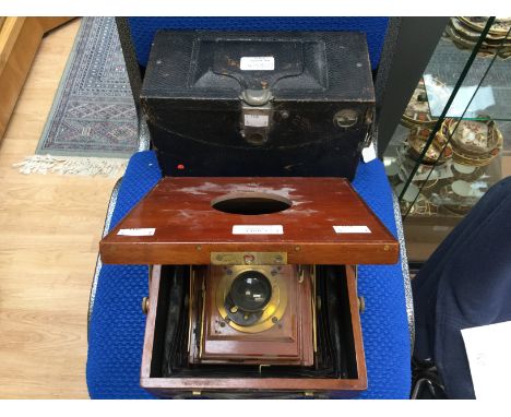 A vintage glass plate camera a/f marked "Reynolds and Branson, Leeds". And a No4 Panoram-Kodak Model D Camera. (2)