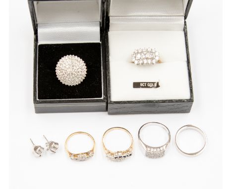 A collection  gold rings comprising an Art Deco diamond ring set in 18ct gold, a 9ct gold rings including a white gold and di