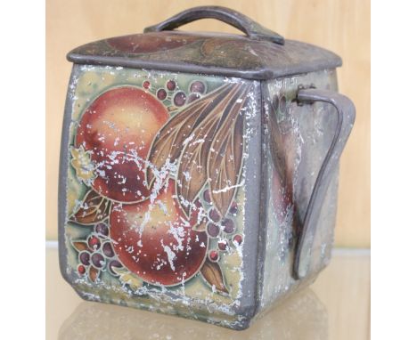 After William Moorcroft, an Arts and Crafts W & R Jacob & Co, biscuit tin, transfer printed with a pomegranate design approx 