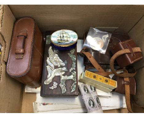 A leather case containing four bottles, a Voightlander camera in case, Oriental box, Bilston enamel box (one box) Hong Kong s