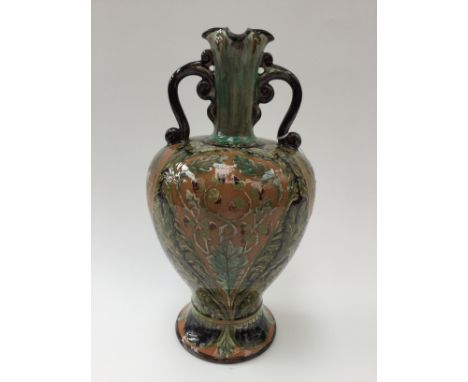 Jessie Sinclair for Della Robbia, an art pottery majolica vase, circa 1890, twin handled shouldered form, clip decorated and 