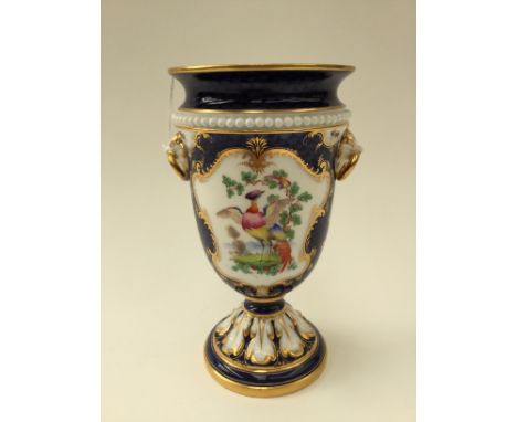 A Royal Worcester blue scale ground vase with exotic bird decoration. Aprox 20 cms high. Circa 1870