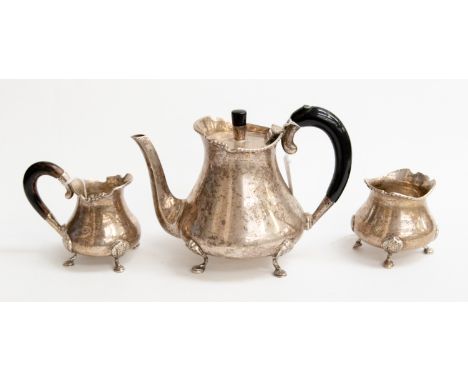 An Indian silver three piece tea service, weighing approx 30.24 ozt, teapot, milk and sugar 