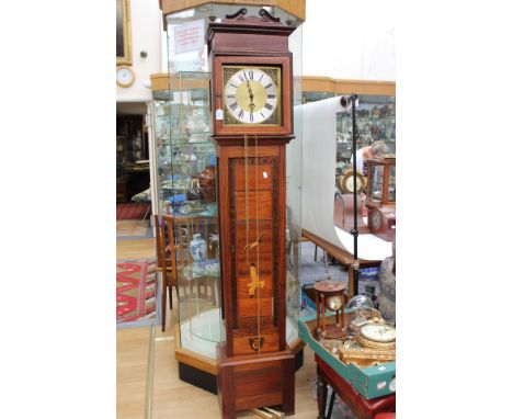 A 20th century inlaid casing, 3/4 height longcase clock, pendulums and weights, silvered dial with applied brass corners, ini