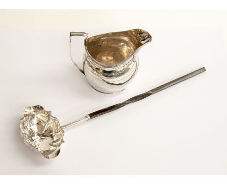 A George III silver jug, bright cut helmet form with reeded rim and handle, London 1801; together with a laminated horn handl
