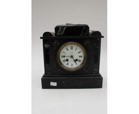A Victorian black marble and slate mantle clock L & F Cole, Cambridge