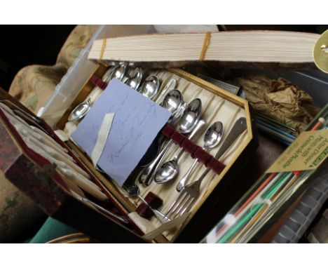 Glass photo frame and EPNS canteen of cutlery in red case, various other EPNS cutlery, a quantity of tea cards, C.P. gentlema