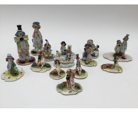 A group of approx fourteen novelty ceramic figures, all indistinctly signed