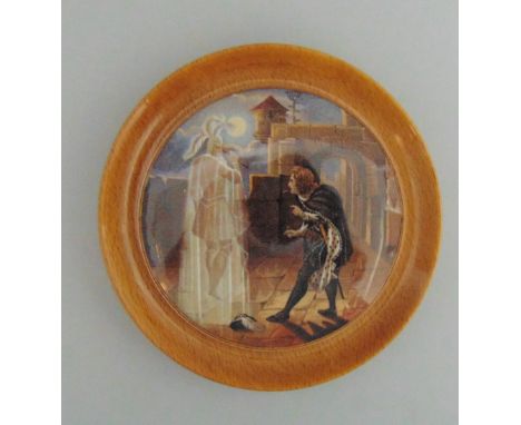 A Staffordshire Prattware Polychrome Pot Lid  mounted in a light wooden frame  'McBeth'Circa 1880Size  10.5cm diamCondition; 